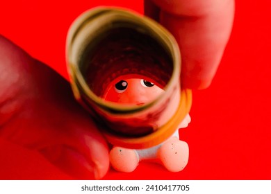 Kid paper dollars,mans hand,child trafficking concept. - Powered by Shutterstock