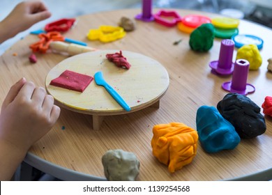 The Kid Play With Play Dough And In The Preschool Or Nursery For Education Concept.