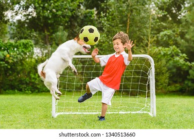 Kid Playing Football (soccer) As Goalie Afraid Of Ball Flying After Header Shot