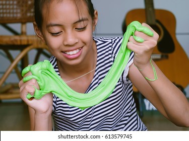 Kid Playing Hand Made Toy Called Slime, Experiment Scientific Method