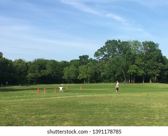 Kid Playing Soccer With Dad