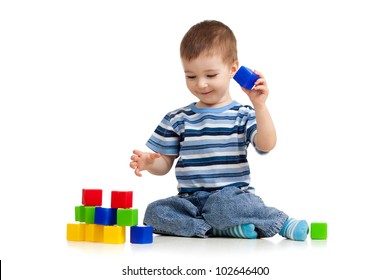 kid playing toy blocks