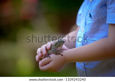Kid plays frog
