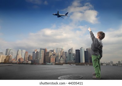 Kid Pointing Flying Airplane