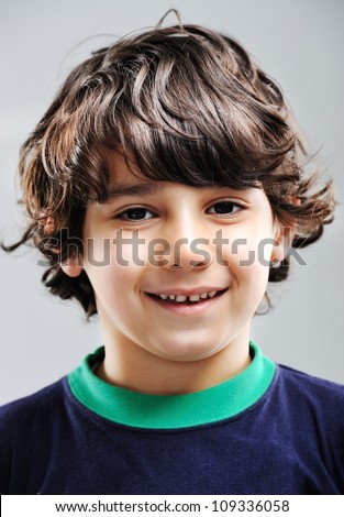 Similar – Image, Stock Photo Brown-haired boy with an athletic physique on an athletic oval massages his muscles with a foam roller for better recovery. Post-workout
