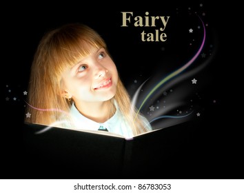 The Kid Reading A Book Of Fairy Tales And Dreaming