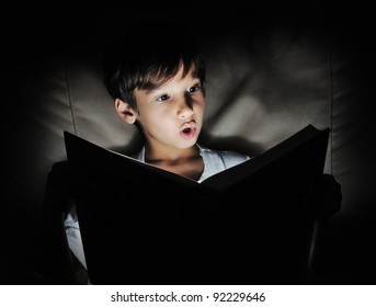 Kid Reading Book, Light In Darkness