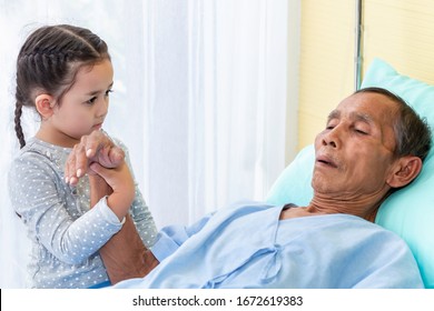 Kid Reassuring And Discussing Her Senior Patient Man On The Hospital.