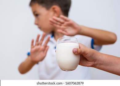 Kid Refusing To Drink Milk. Lactose Intolerance. Dairy Intolerant Child Refuses To Drink Milk