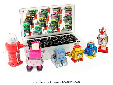 Kid Robots Wtching A Robot Army On A Laptop Isolated On White