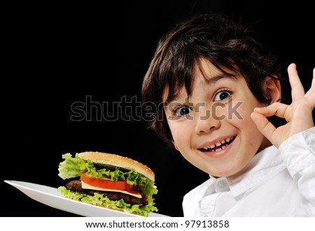 Kid serving burger