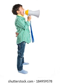 Kid Shouting By Megaphone Over White Background