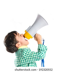 Kid Shouting By Megaphone Over White Background 