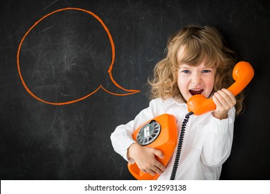 Kid Shouting Through Vintage Phone. Business Communication Concept