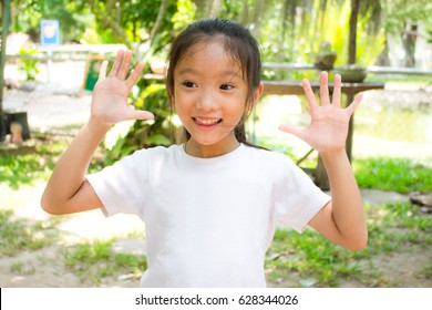 Kid Showing Two Clean Hands.