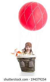 Kid Sitting Inside Basket On Hot Air Balloon