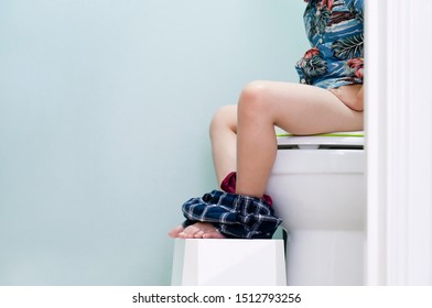 Girl Grunting While Pooping
