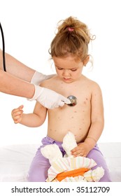 Kid With Skin Rash Or Small Pox Being Examined At The Physician - Isolated