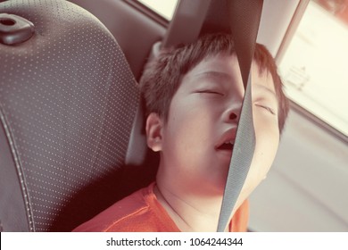 Kid Sleep On Car. Child Feel Sick. Sleep On Car Seat
