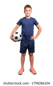 Kid In Sport Uniform Holding A Classic Soccer Ball And Smiling Isolated On White