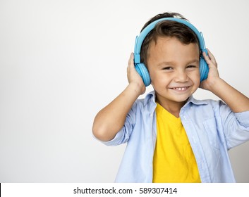 Kid Studio Shoot Using Headphone Listening Music