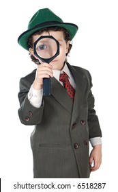 Kid In A Suit With A Magnifying Glass