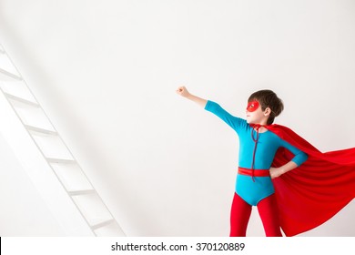 Kid Superhero On White Background.