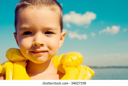 Kid With Swimming Vest