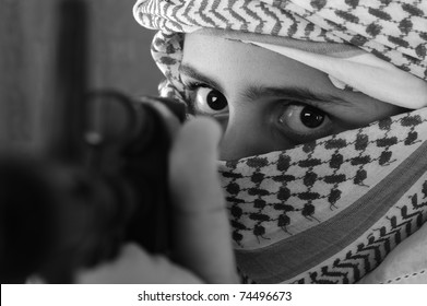 Kid terrorist with a weapon