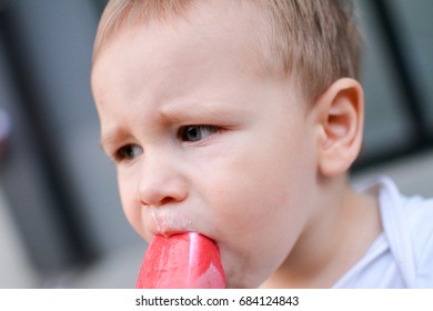 Kid Toddler Baby Boy Eating His First Ice Cream On Popsicle 
Child Eating Ice Cream 