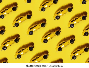 Kid Toy Cartoon Miniature Yellow Car Model Playful Isometric Seamless Pattern Wallpaper. Minimal Auto Repair Shop Or Vehicle Transport Insurance Concept Background Banner. Flat Lay.