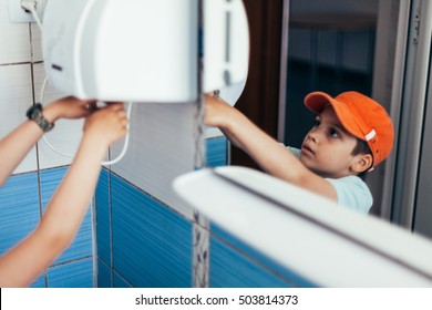 Kid Using Hand Dryer