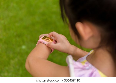 Kid Using Smartwatch