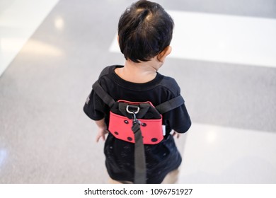 Kid Walking With Leash