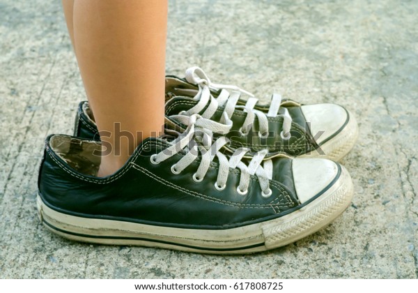 Kid Wearing Adult Shoes Stock Photo (Edit Now) 617808725