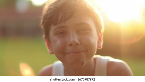 
Kid Wearing Braces Smiling Outside With Lens-flare Portrait