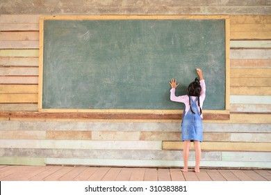 Kid Write Back To School Font On Old Green Chalkboard 