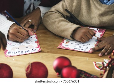 Kid Writing Christmas Wish List