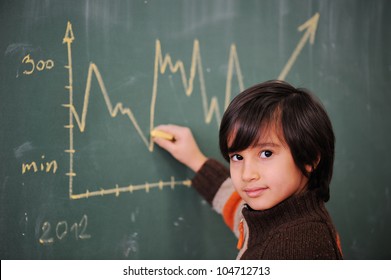 Kid Writing Diagram On Blackboard