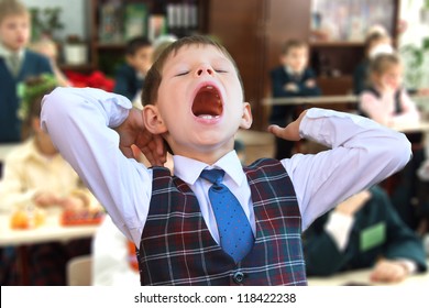 Kid Yawning At The Lesson