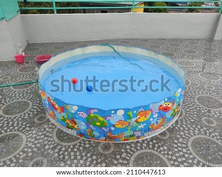 A kiddie pool filled with water