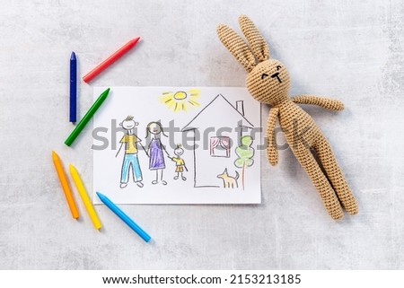 Kiddie stily drawing with rabbit toy. Happy family concept
