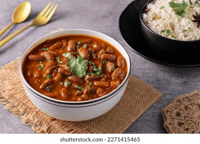 Kidney bean curry or rajma or rajmah chawal and rice roti. Typical north Indian food main course. Basmati rice with dal curry in Delhi Mumbai Rajasthan India.	