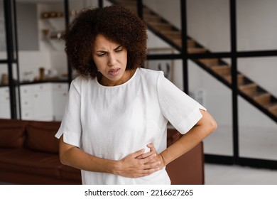 Kidney infection pyelonephritis urinary tract infection. African american woman feel backache spine pain because of UTI pyelonephritis disease - Shutterstock ID 2216627265
