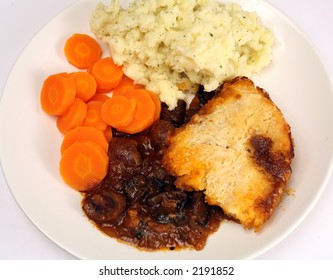 A Kidney And Mushroom Pie, With Suet Crust Pastry, Creamed Parsley Potatoes And Boiled Carrots.