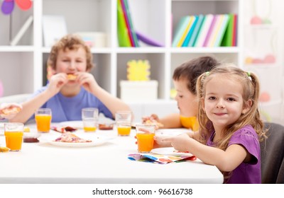 Kids Around The Table Eating