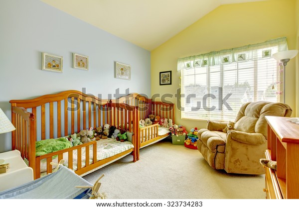 two cribs for twins