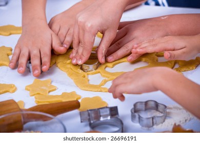 Kids Baking And Decorating Christmas Cookies