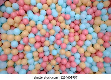 Kids Ball Pit Or Ball Pool With Many Colorful Balls As Background