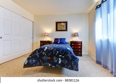 Kids Bedroom With Blue Boys Blanket